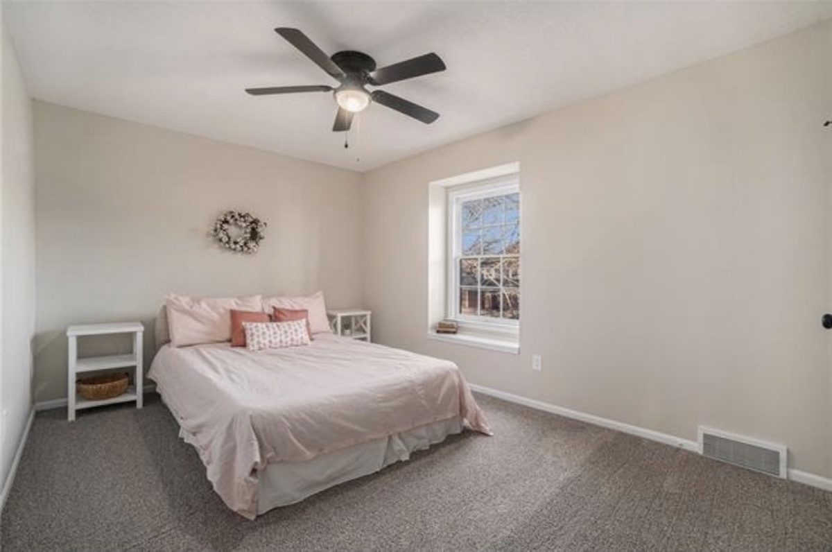 After: calm, airy primary bedroom staged in a neutral palette