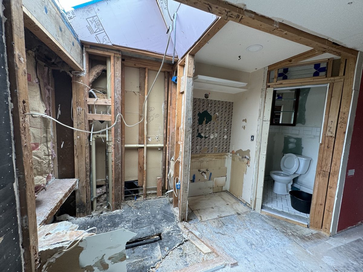 Before: bathroom gutted to the studs during renovation